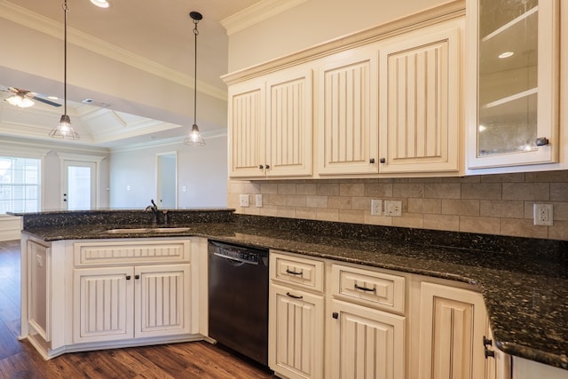 3982 Karaline Cir, Valdosta, GA 31605 - kitchen with cream cabinetry, black dishwasher, ornamental molding, decorative backsplash, and dark wood-type flooring