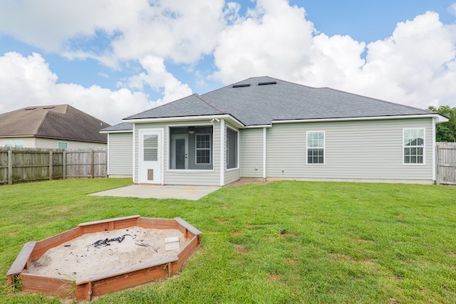 3982 Karaline Cir, Valdosta, GA 31605 - back of property with a patio, a fenced backyard, and a shingled roof