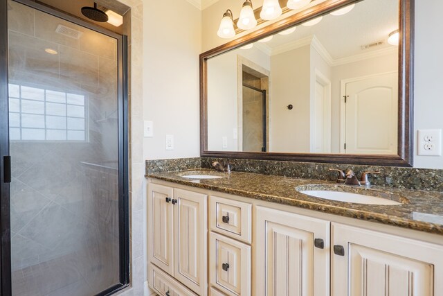 3982 Karaline Cir, Valdosta, GA 31605 - bathroom with a shower stall, ornamental molding, and double vanity