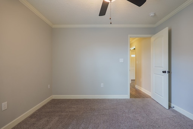 3982 Karaline Cir, Valdosta, GA 31605 - spare room with carpet flooring, crown molding, ceiling fan, a smoke detector, and a textured ceiling