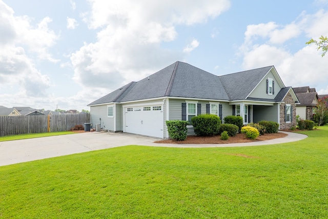 3982 Karaline Cir, Valdosta, GA 31605 - view of front of house featuring driveway, a garage, and roof with shingles