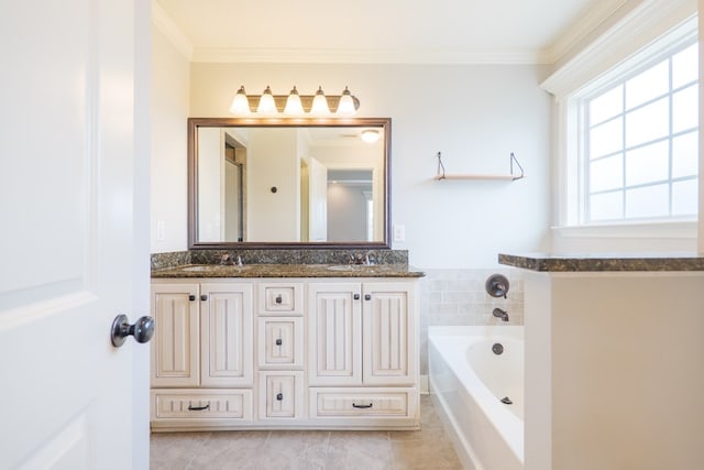 3982 Karaline Cir, Valdosta, GA 31605 - bathroom featuring tile patterned floors, double vanity, a bath, and ornamental molding