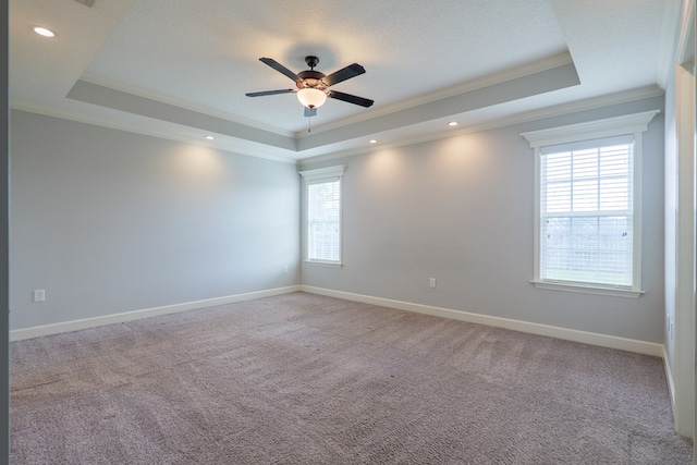 3982 Karaline Cir, Valdosta, GA 31605 - spare room featuring a raised ceiling, crown molding, a ceiling fan, carpet, and recessed lighting