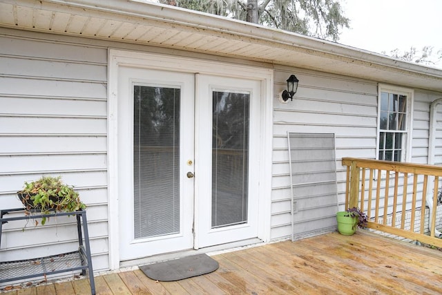 entrance to property with a deck