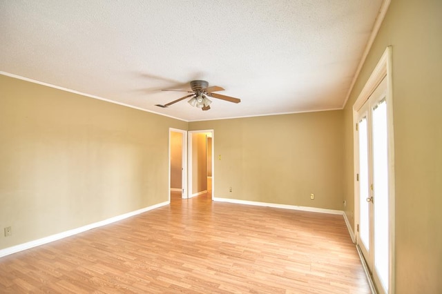 unfurnished room featuring light hardwood / wood-style flooring, ceiling fan, and crown molding