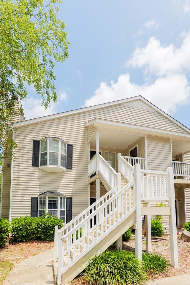 view of front of house featuring stairway