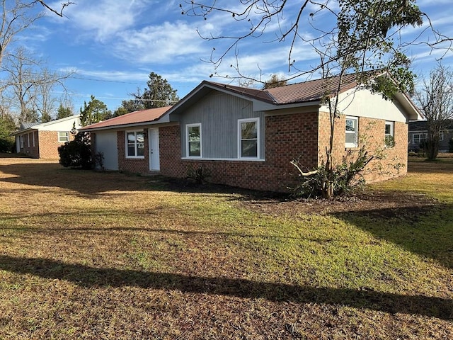 exterior space with a front yard