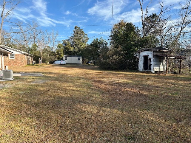 view of yard featuring central AC