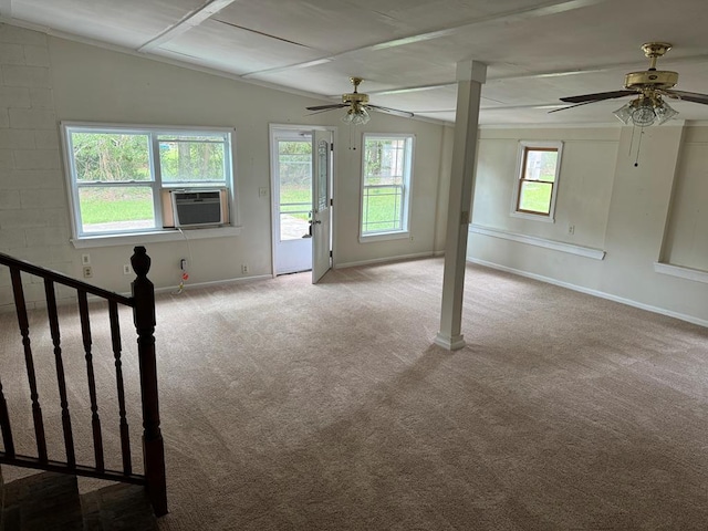 unfurnished room featuring light carpet, ceiling fan, and vaulted ceiling