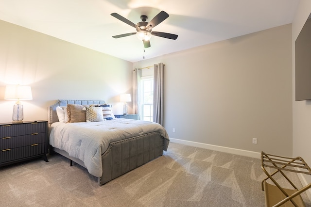 5039 Hatfield Cir, Hahira, GA 31632 - bedroom with light colored carpet, baseboards, and ceiling fan