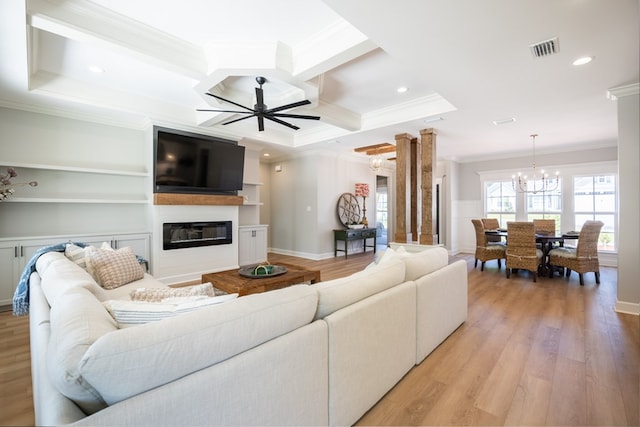 5039 Hatfield Cir, Hahira, GA 31632 - living area with crown molding, a ceiling fan, coffered ceiling, a glass covered fireplace, and light wood-style floors