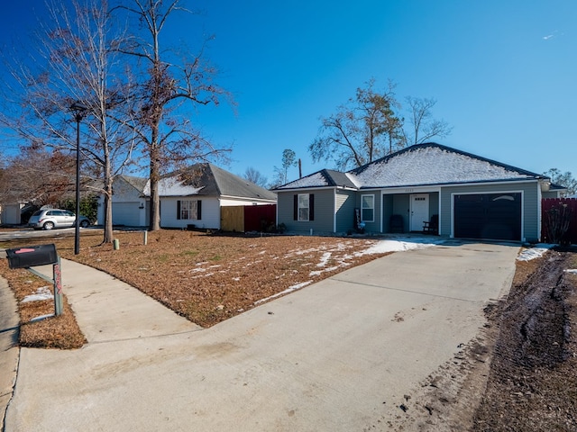 single story home featuring a garage