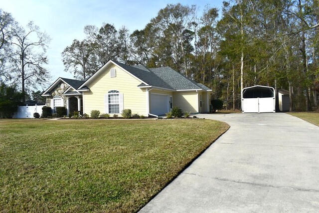 view of front facade with a carport and a front yard