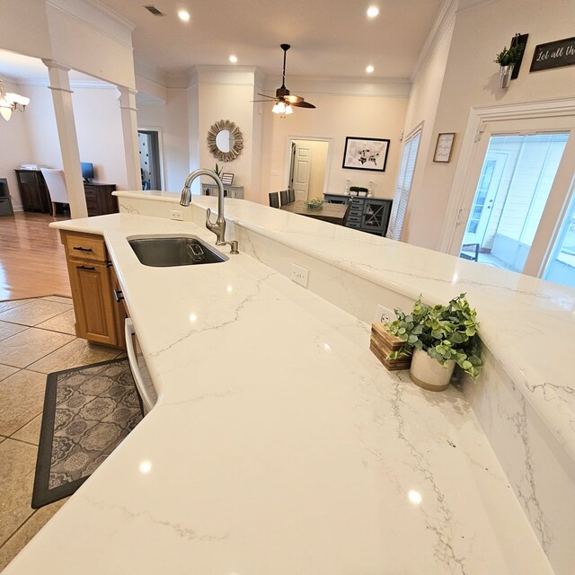 home office featuring crown molding, a chandelier, and light hardwood / wood-style flooring