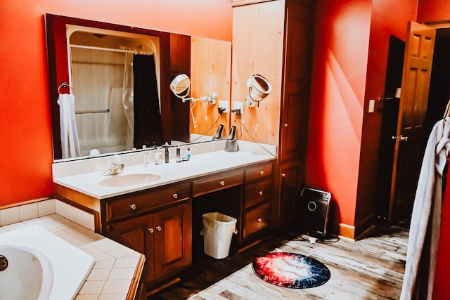 bathroom featuring vanity and a bathing tub