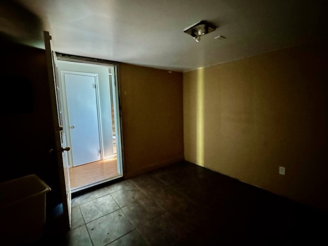 11 Crestwood Cir, Valdosta, GA 31602 - empty room featuring dark tile patterned floors