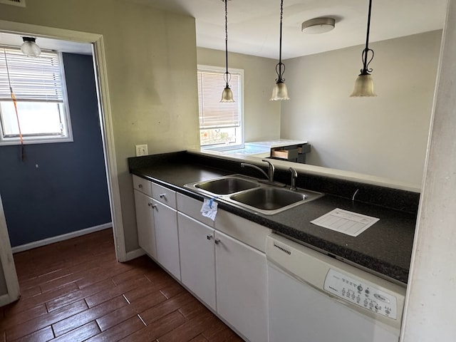 11 Crestwood Cir, Valdosta, GA 31602 - kitchen with dishwasher, a sink, dark countertops, and plenty of natural light