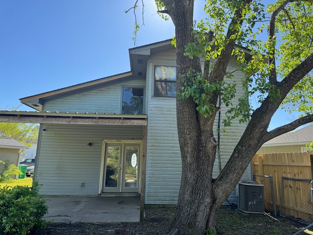 11 Crestwood Cir, Valdosta, GA 31602 - rear view of house featuring fence, central air condition unit, and a patio area