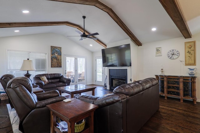 living room featuring ceiling fan, dark hardwood / wood-style flooring, and lofted ceiling with beams