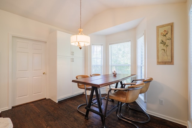 206 Harris Trl, Lake Park, GA 31636 - dining space with dark wood-style flooring, vaulted ceiling, and baseboards