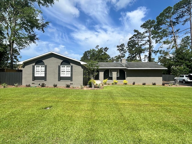 2202 Gornto Rd, Valdosta, GA 31602 - ranch-style house with brick siding and a chimney