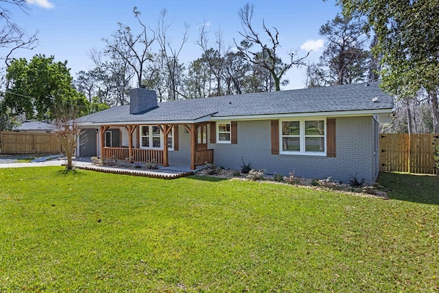 single story home with covered porch, a chimney, fence, and brick siding