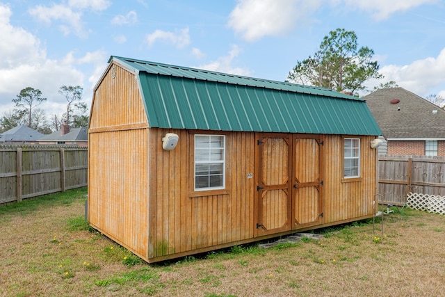 view of outdoor structure featuring a yard