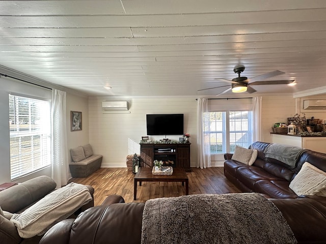 living room featuring a wall mounted air conditioner, hardwood / wood-style floors, and ceiling fan