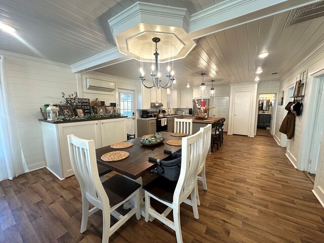 dining space with ornamental molding, dark hardwood / wood-style flooring, a wall mounted air conditioner, and wood ceiling