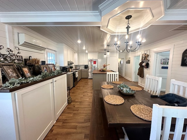 dining room featuring crown molding, wood ceiling, a wall mounted AC, dark hardwood / wood-style floors, and a notable chandelier