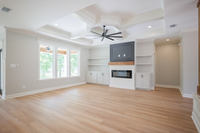 unfurnished living room featuring crown molding, ceiling fan, coffered ceiling, light hardwood / wood-style floors, and beamed ceiling