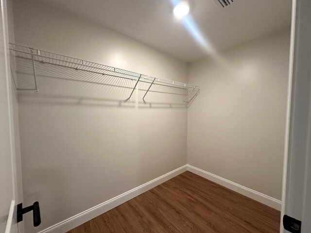 804 S Forrest Ave, Adel, GA 31620 - spacious closet featuring dark wood finished floors