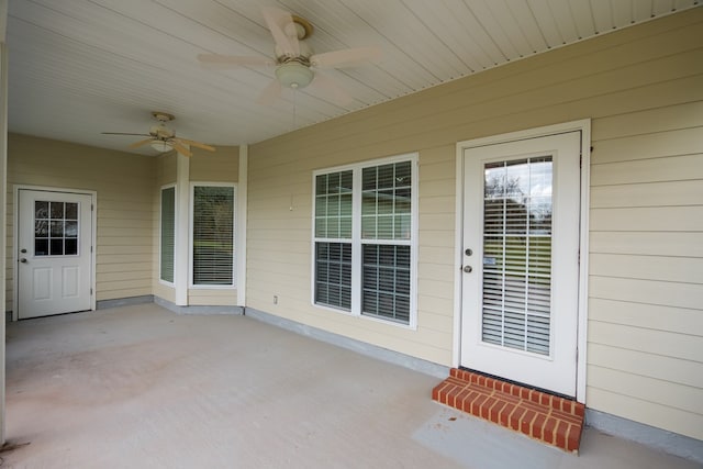 exterior space featuring a ceiling fan and a patio