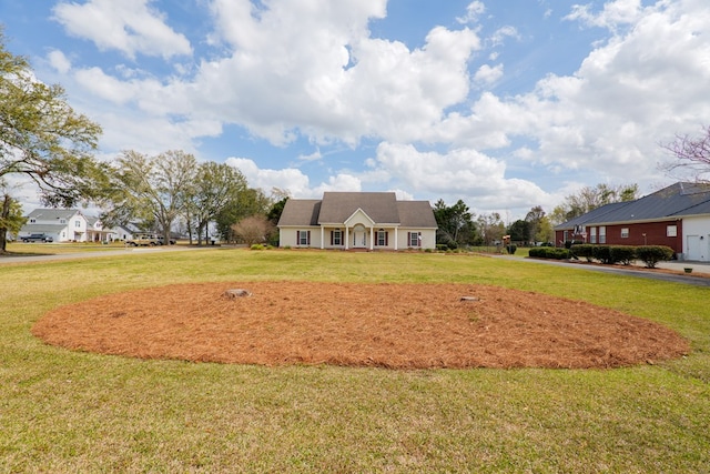 exterior space featuring a front yard