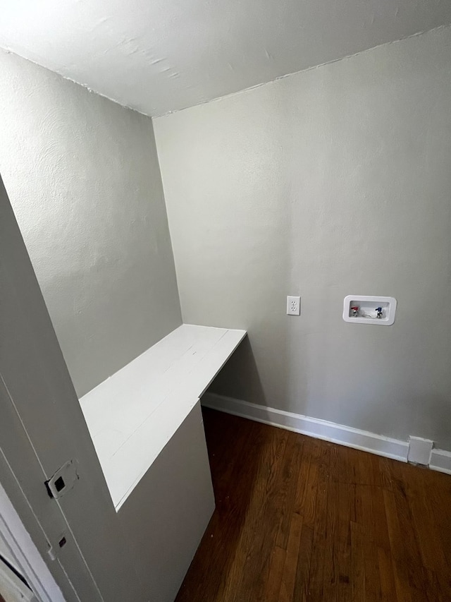 clothes washing area featuring washer hookup and dark hardwood / wood-style floors