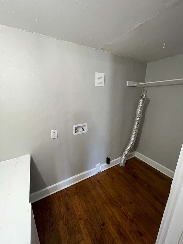 washroom with washer hookup and dark hardwood / wood-style floors