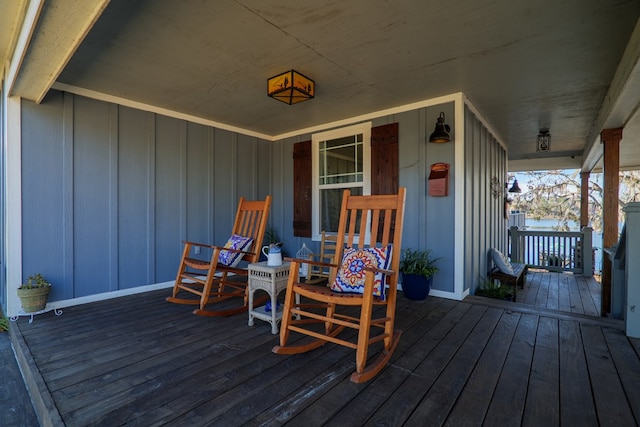 wooden deck featuring covered porch