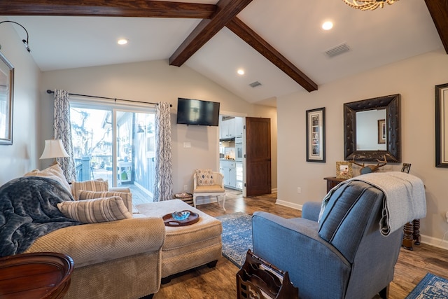 living room featuring vaulted ceiling with beams and wood-type flooring