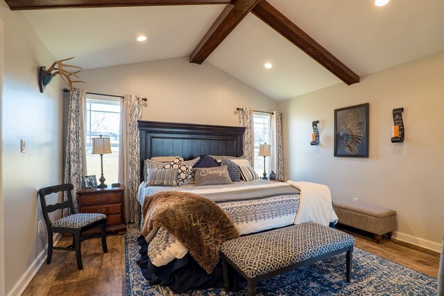 living room with hardwood / wood-style floors, lofted ceiling with beams, and a chandelier