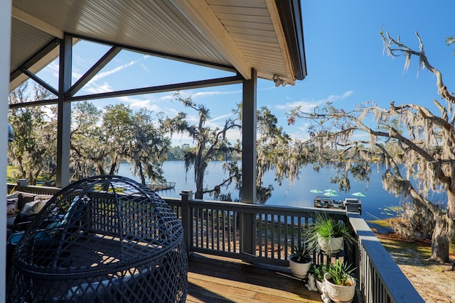 wooden terrace with a water view