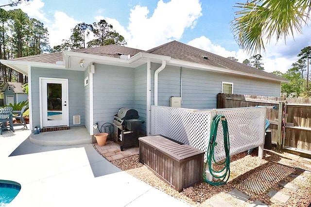 3342 Norton Pl, Valdosta, GA 31605 - view of side of property featuring a patio and roof with shingles