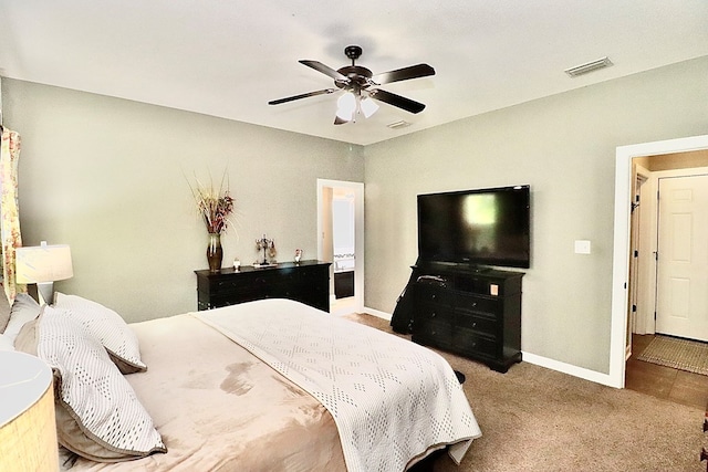 3342 Norton Pl, Valdosta, GA 31605 - carpeted bedroom with baseboards and ceiling fan