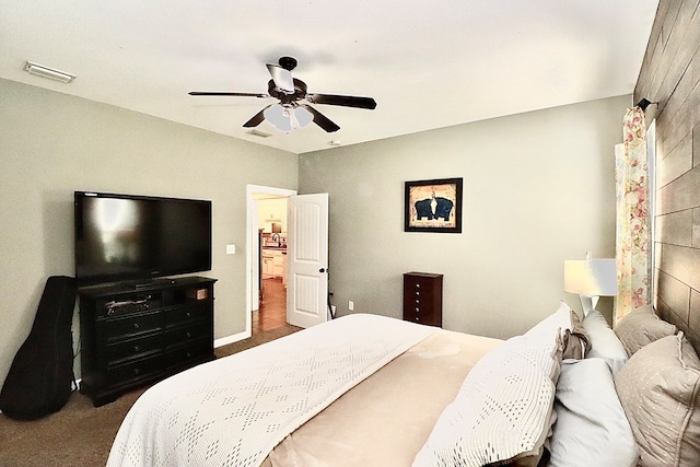 3342 Norton Pl, Valdosta, GA 31605 - bedroom featuring dark colored carpet and a ceiling fan