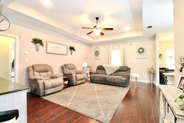 3342 Norton Pl, Valdosta, GA 31605 - living room with a raised ceiling, dark wood finished floors, and ceiling fan