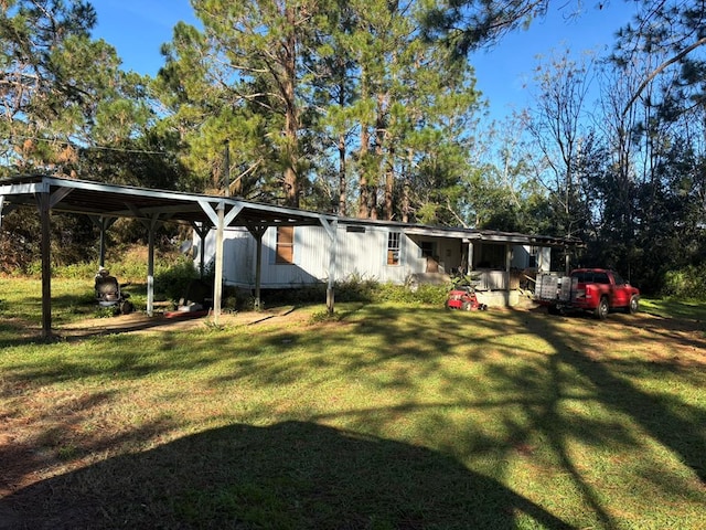 view of yard featuring a carport