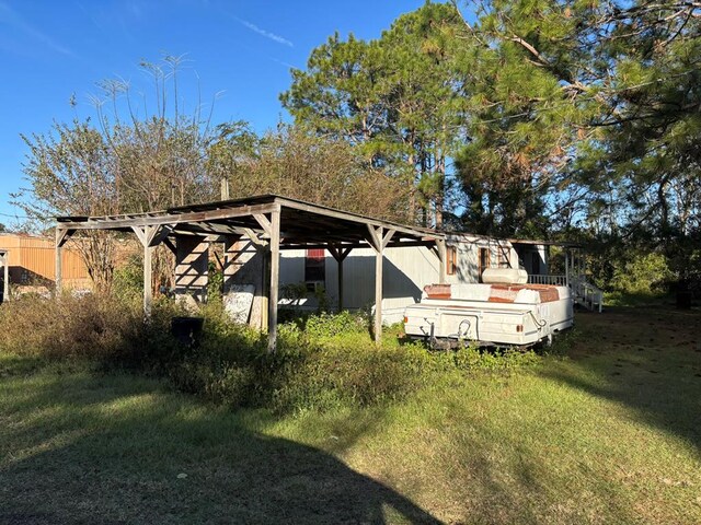 56 Egypt Rd Unit 10, Thomasville, GA 31757 - view of property exterior with a lawn