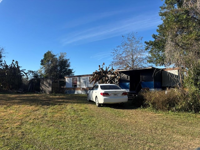 view of yard with a carport