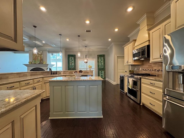 5029 Falling Spgs, Valdosta, GA 31602 - kitchen featuring stainless steel appliances, recessed lighting, crown molding, backsplash, and light stone countertops