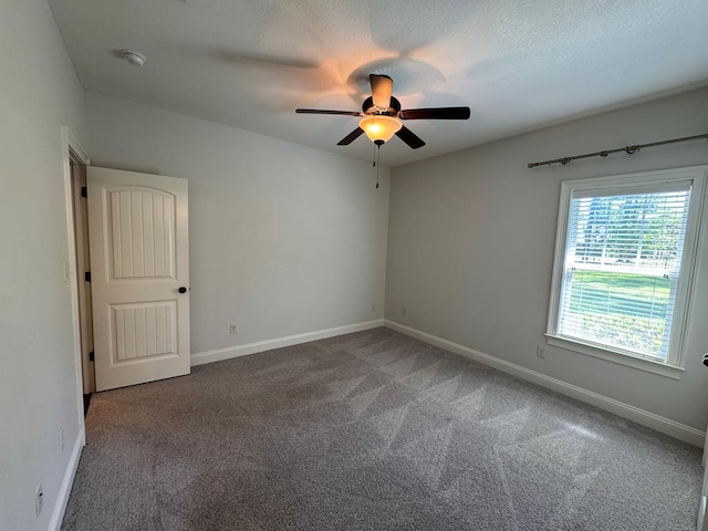 5029 Falling Spgs, Valdosta, GA 31602 - empty room featuring ceiling fan, carpet flooring, and a smoke detector