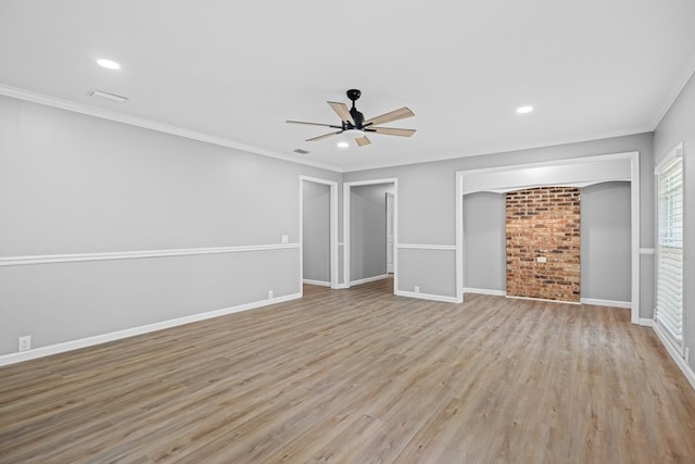 4848 Lori St, Valdosta, GA 31605 - unfurnished living room with a ceiling fan, light wood finished floors, crown molding, baseboards, and recessed lighting